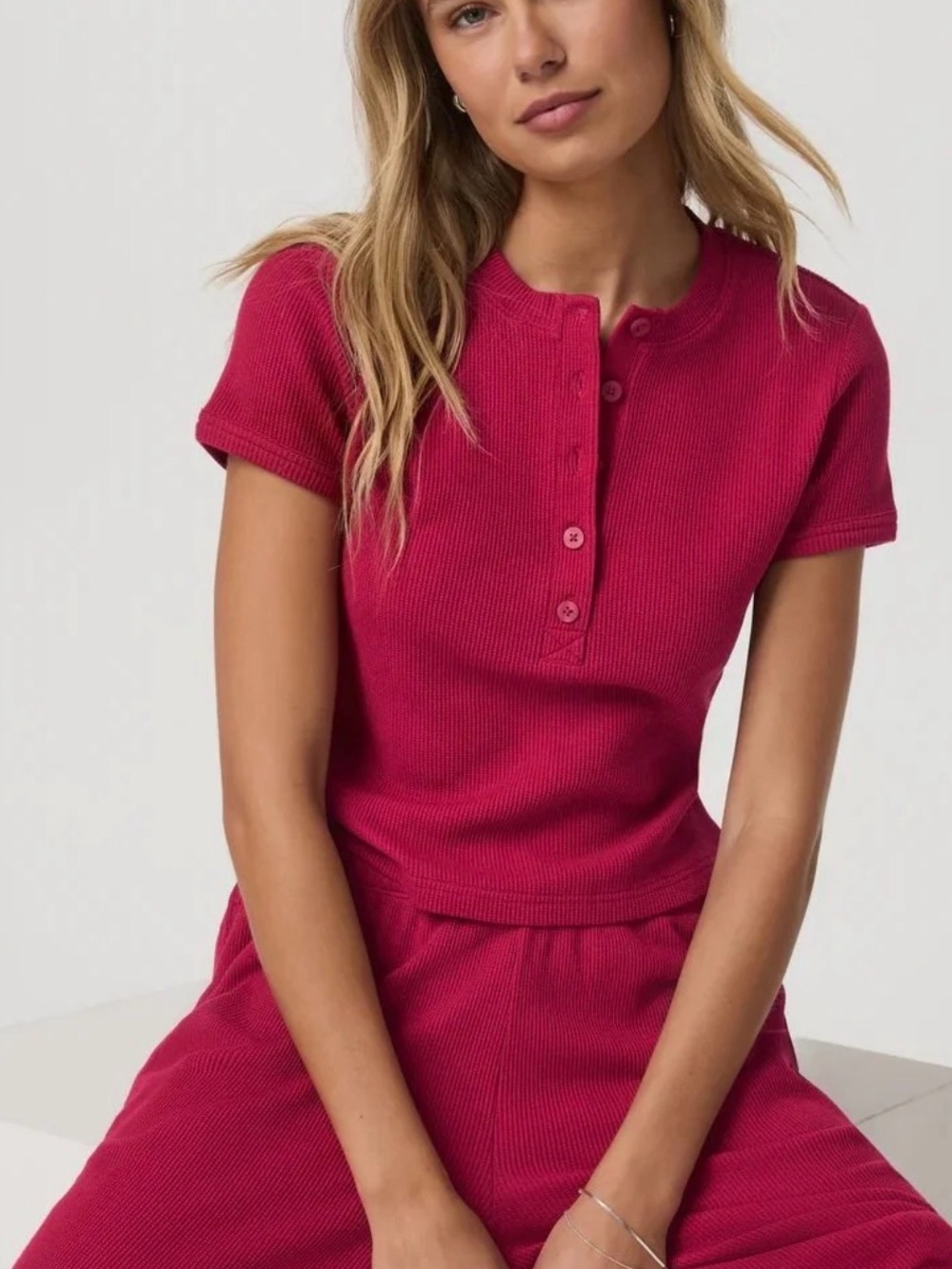 Vuori waffle baby tee in the color strawberry